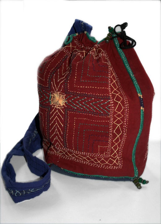 Hand embroidered drawstring bag from recycled textiles