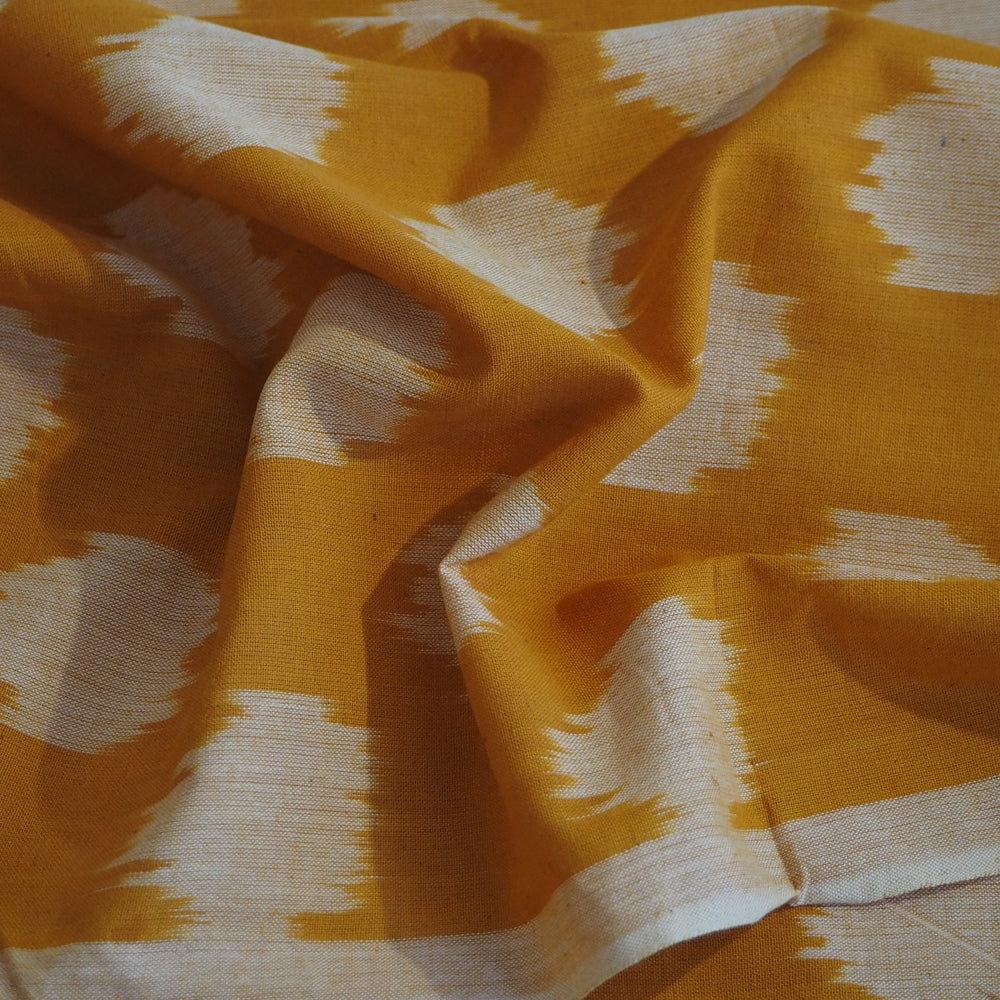 Hand woven Pochampally orange/white Ikat cotton fabric
