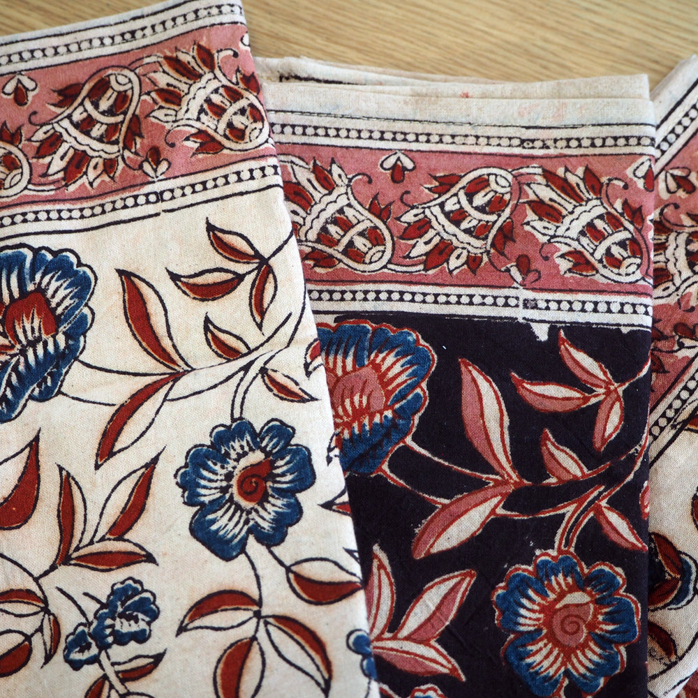 A set of four hand printed table napkins with natural dyes